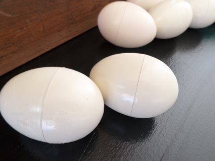 Paint old plastic Easter eggs to look real