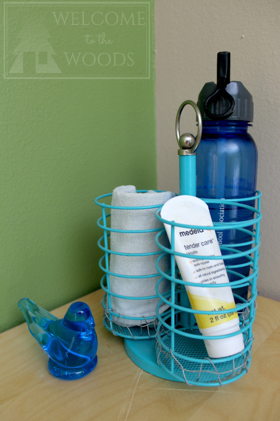 Essentials to have on your tabletop next to where you'll breastfeed. Water, towel, and nipple cream.