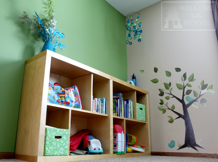 Awesome IKEA shelving turned on its side to make a bookcase for children's books.