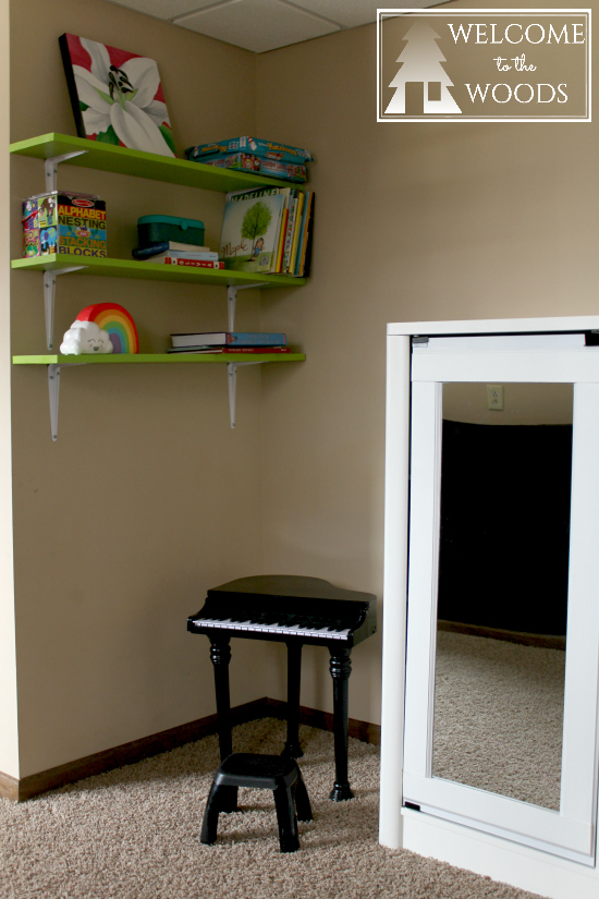 mini grand piano in a little girls bedroom