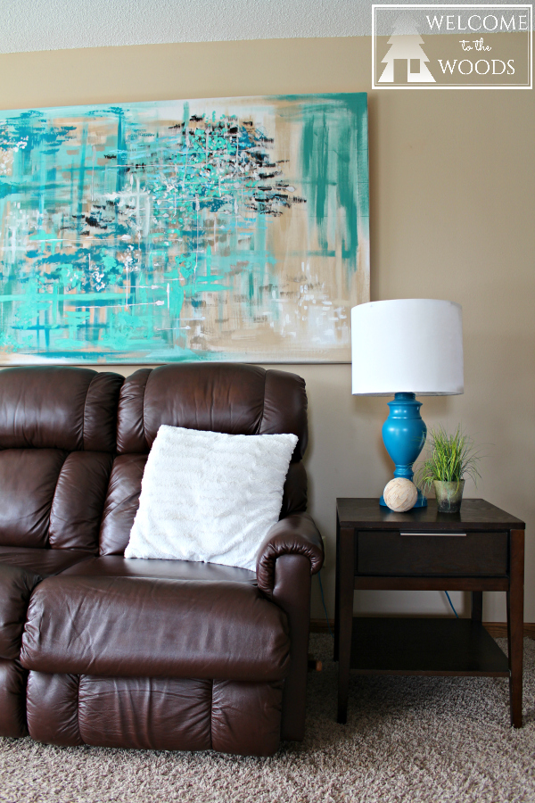 I love this giant piece of abstract artwork over the couch! 