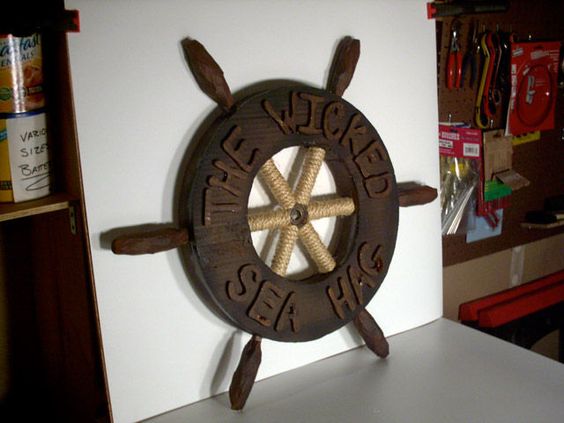 Cardboard Ship Wheel and Fake Portholes - welcome to the woods