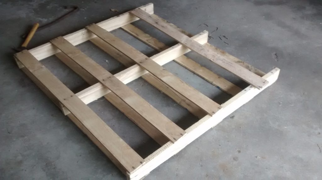 Use pallet wood to create a really cool wall clock