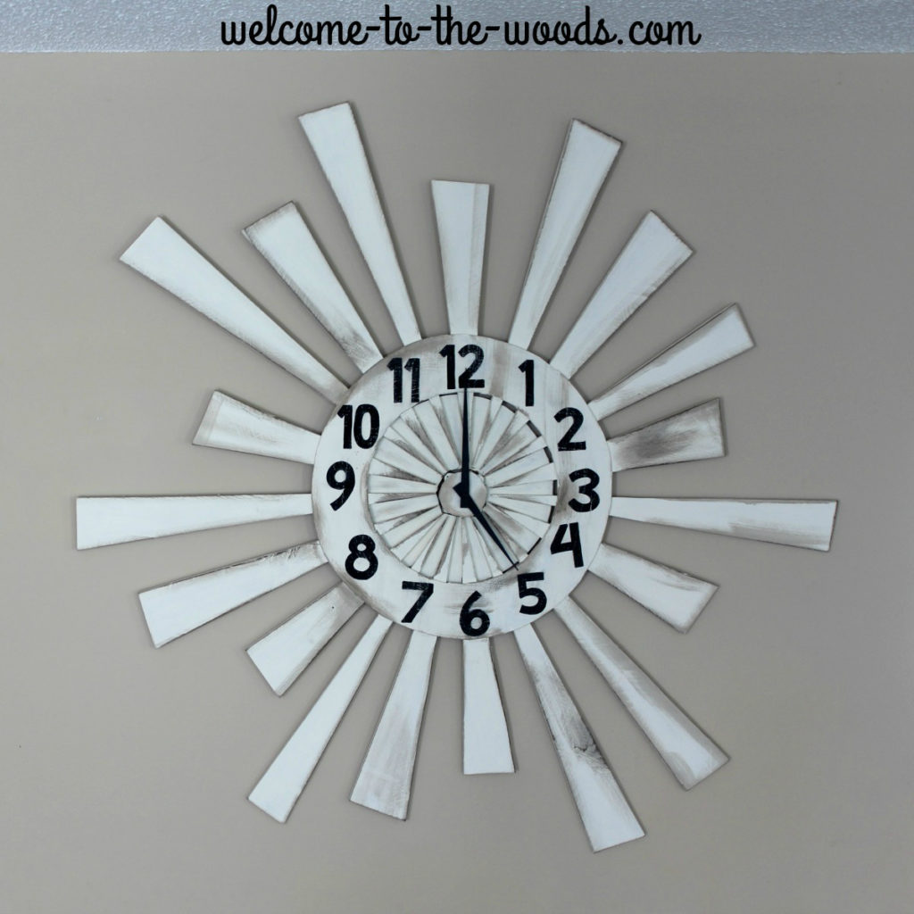 An amazing pallet wood wall clock that is huge and makes a statement!