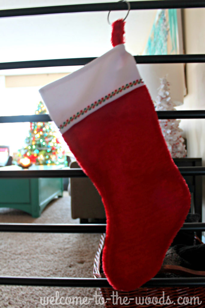 Hang your stockings on your stair railing or any bar (like a curtain rod!?) What a great idea for those homes without a fireplace!