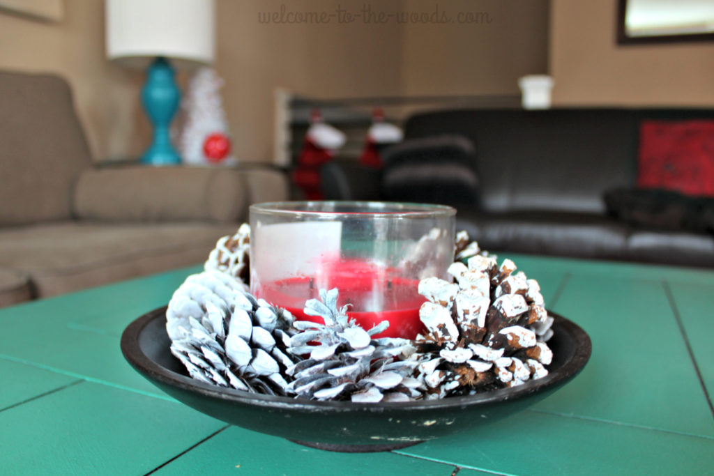 Spray paint pine cones white and use them in a bowl or as vase filler for winter Christmas or holiday decorations in your home!