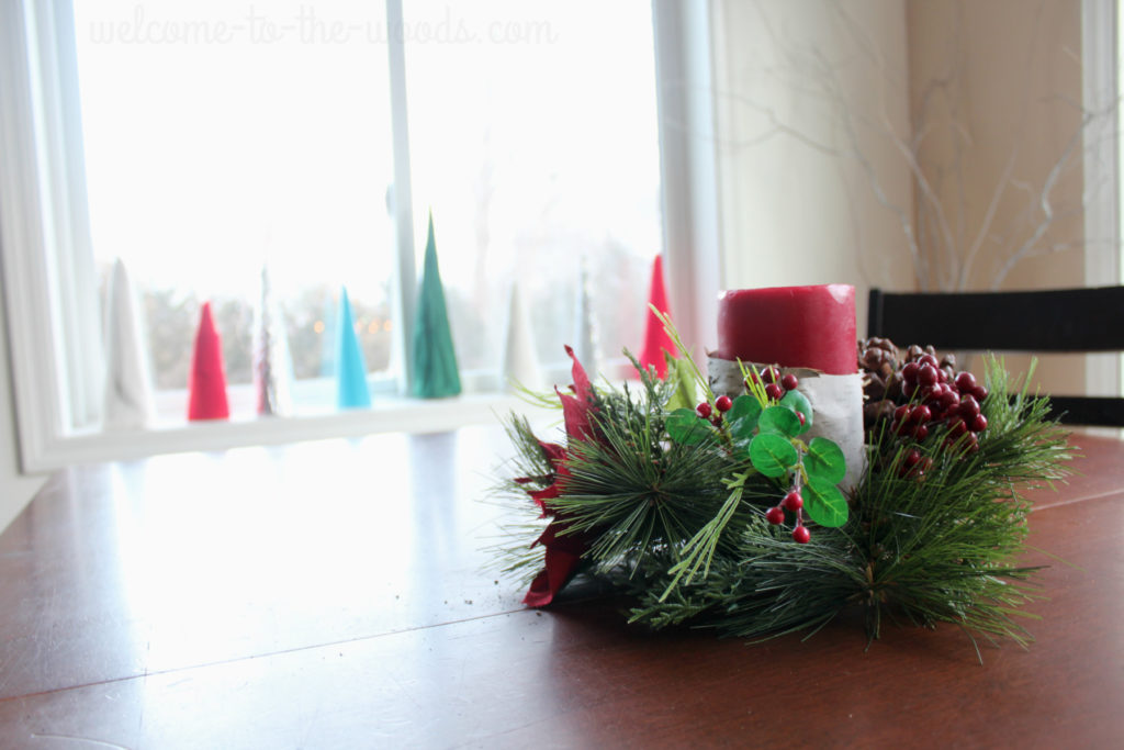 Wrap candles in birch bark for a simple Christmas centerpiece.