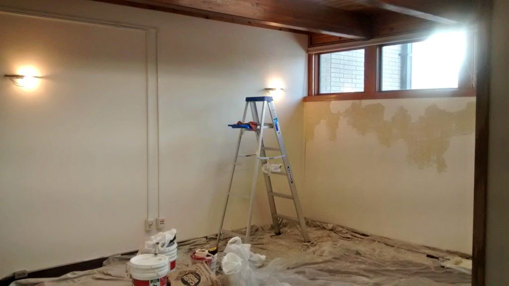 The room before the faux finish was applied, plaster chipped off and ready for wall paper.