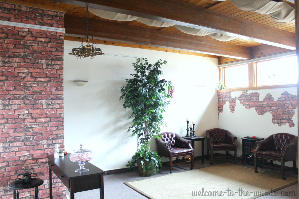 This faux brick wall paper is only $20 a roll. I used one roll to create this brick and plaster wall as well as create a faux brick pillar.