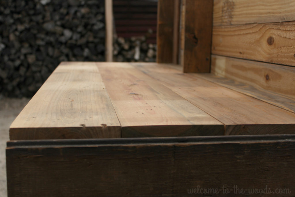 Cover existing piece of furniture with reclaimed barn wood for an industrial chic look