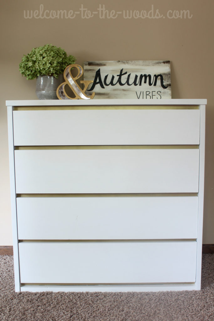 This well-built wood dresser was once a mid-century piece but now looks super modern