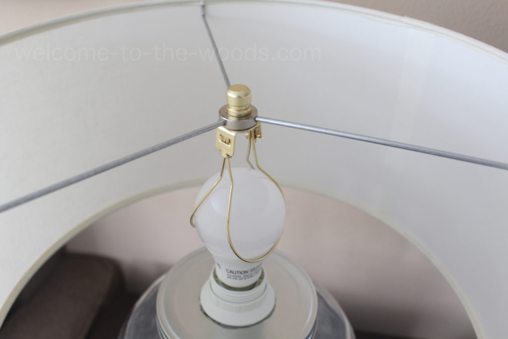 Attach a lamp shade using a light bulb clamp instead of buying a uno fit or harp style lamp shade.