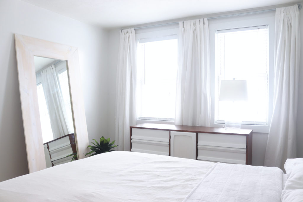 Minimalist bedroom design, white billowy curtains, soft texture and beautiful furnishings